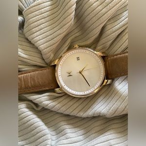 MOVADO gold and pearl watch! It’s beautifully made.